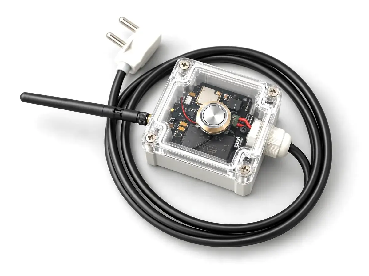 GT Button: a single illuminated metal push button inside a clear enclosure with external antenna and mains cable