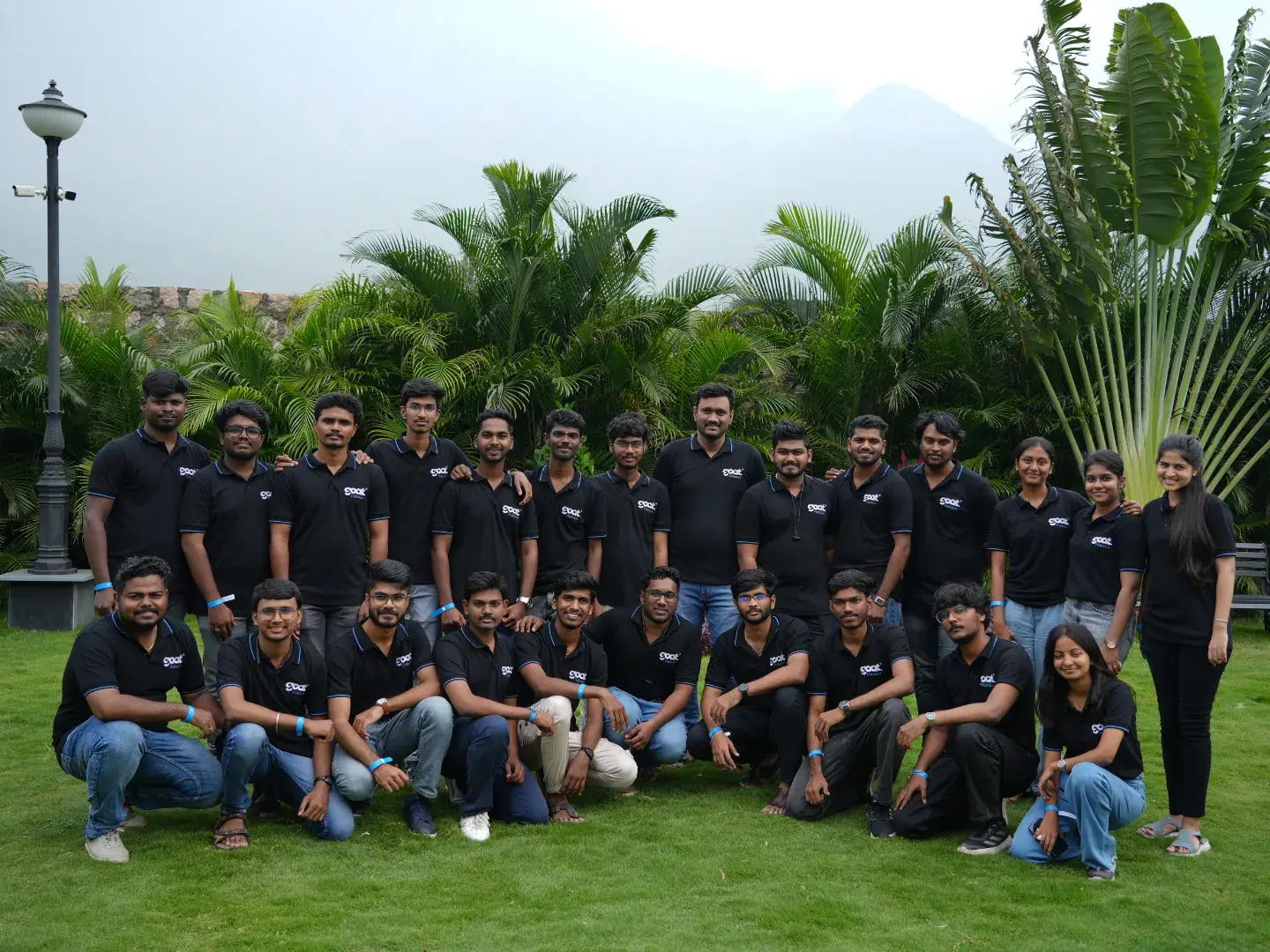Engineers in a group photo on the lawn