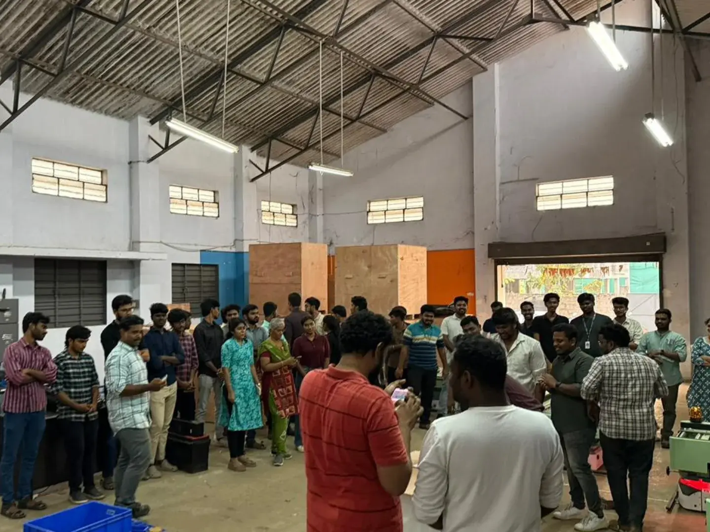 Celebration on the factory floor in Neelambur