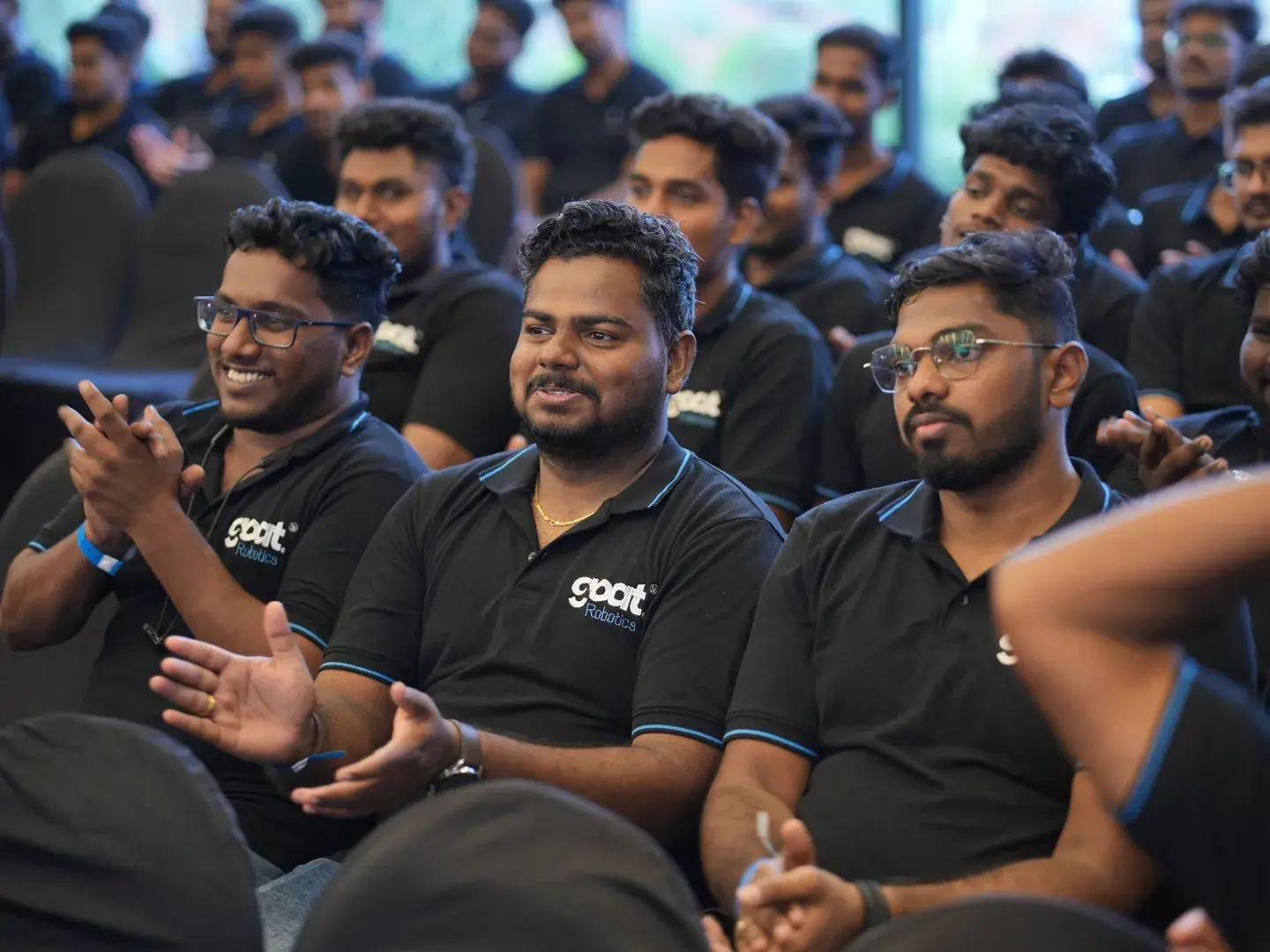 Team members applauding at Foundation Day