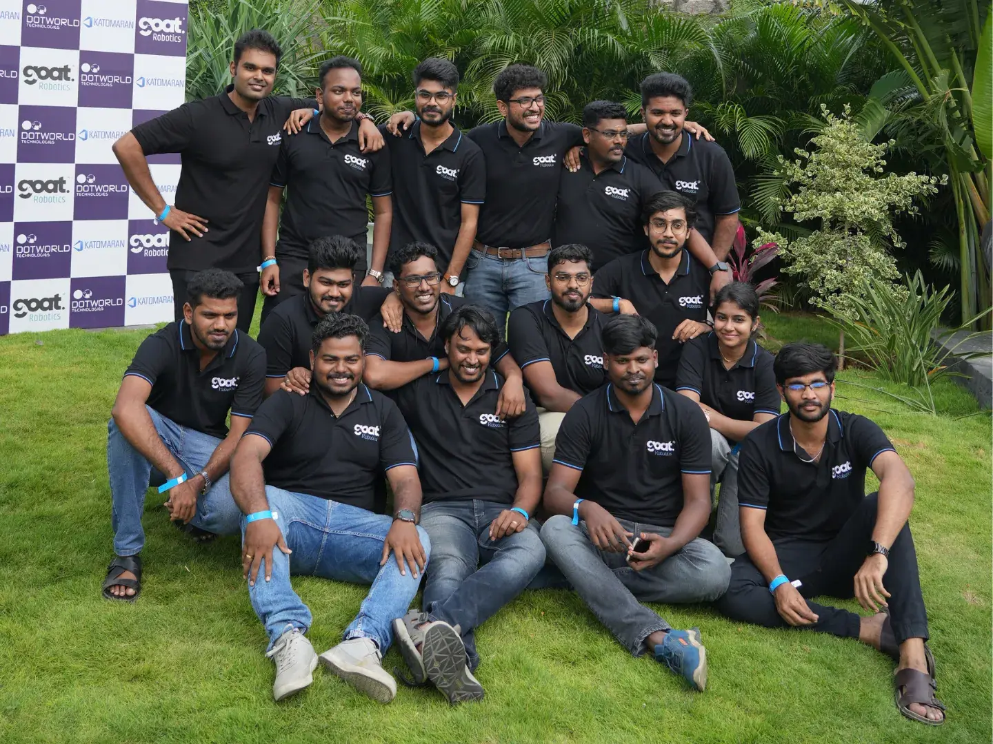 Team group photo in front of the offsite backdrop