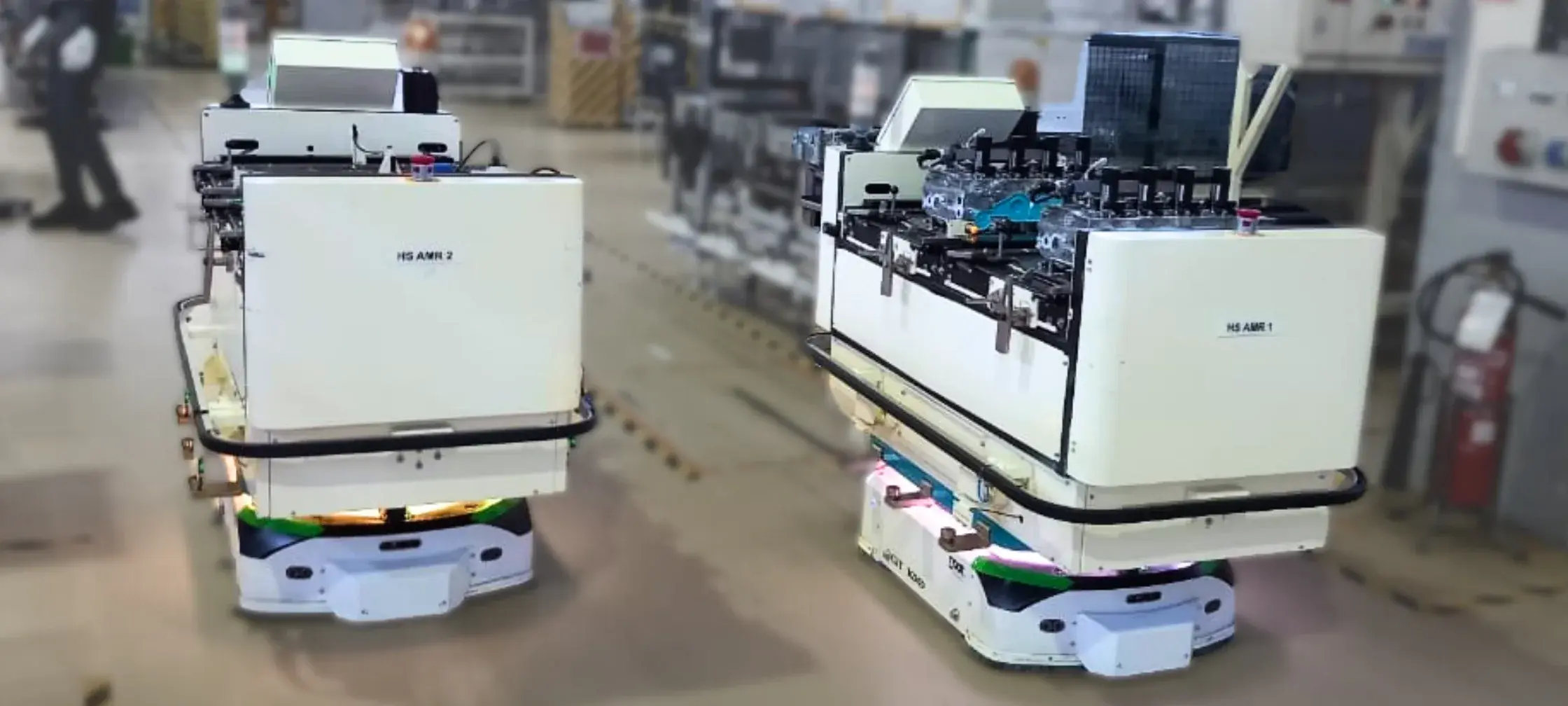 Car bodies moving along an automotive assembly line